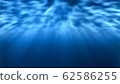 Underwater Light Rays Shine Bright Underneath Rippling Ocean Waves - Abstract Background Texture 62586255