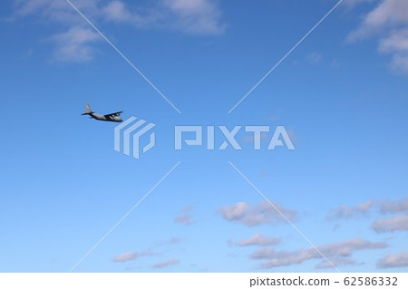Plane flying in the sky of Minamiizu Plane flying in the sky of Minamiizu 62586332