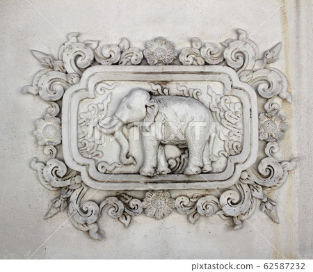 Stucco white sculpture decorative pattern wall 62587232