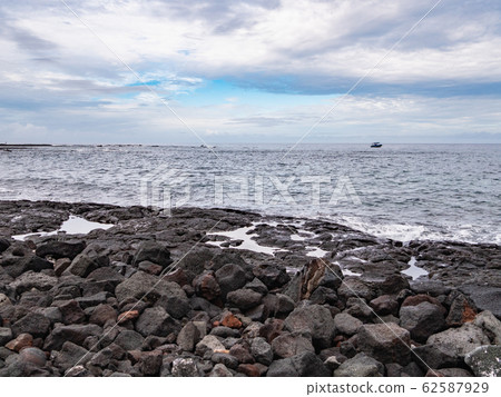Lava and ocean scenery at Pu'uhonua National Historical Park on the Big Island of Hawaii Lava and ocean scenery at Pu'uhonua National Historical Park on the Big Island of Hawaii 62587929