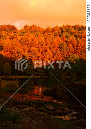 Burning autumn sunset 62588156