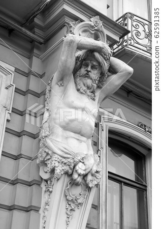 Statue of Atlant, part of the decoration of an Statue of Atlant, part of the decoration of an 62591385