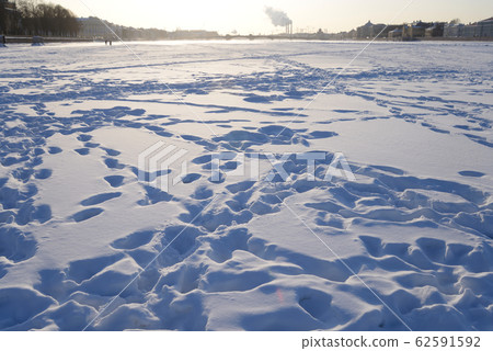Frozen Neva river in center of St.Petersburg. Frozen Neva river in center of St.Petersburg. 62591592
