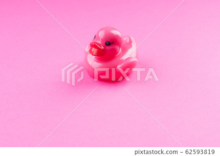Pink glamour rubber duck on monochrome background 62593819