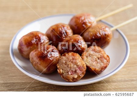 Thai sausage or Isan sausage, grilled fermented rice with pork Thai sausage or Isan sausage, grilled fermented rice with pork 62595687