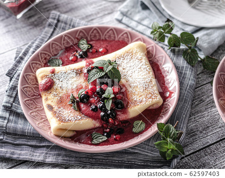 Cheese blintzes crepes 62597403