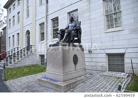John Harvard statue with shiny left foot John Harvard statue with shiny left foot 62599459