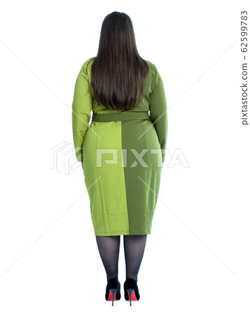 Plus Size Model with long hair posing in studio 62599783