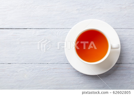 Cup of tea on a grey wooden background. Copy space. Top view. 62602805