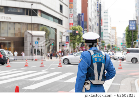 Police officer performing traffic control Police officer performing traffic control 62602825