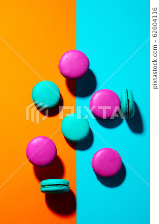 Macaroons dessert on colorful background. Top view. Macaroons dessert on colorful background. Top view. 62604116