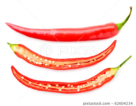 Hot red pepper and two halves on a white Hot red pepper and two halves on a white 62604234
