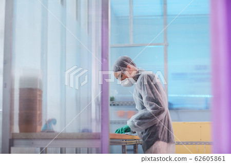 Man in the factory 62605861