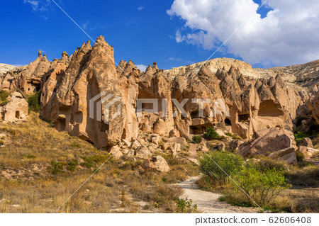 Cave town in Zelve Valley, Cappadocia in Turkey. Cave town in Zelve Valley, Cappadocia in Turkey. 62606408