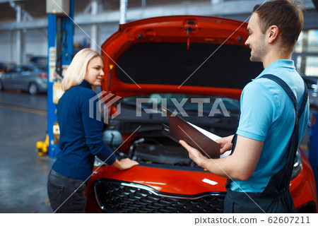 Driver and worker with checklist, car service Driver and worker with checklist, car service 62607211
