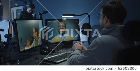 Digital artists discussing an animated film 62608806