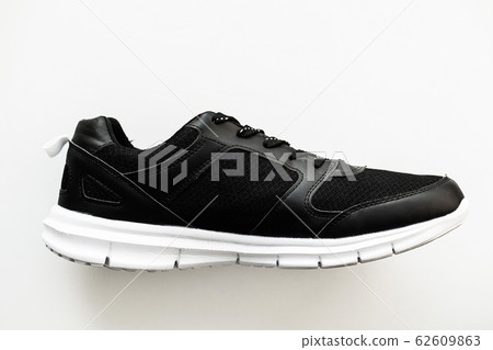 Stylish black fashion sneakers on white background. 62609863
