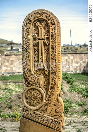 Stone cross carved with ornaments in the form of the twenty-fourth  letter  of the Armenian alphabet, created by Mesrop Mashtots in the village of Oshakan 62610042