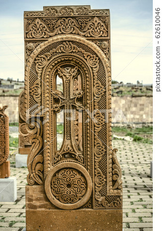 Stone cross carved with ornaments in the form of the eighteenth letter  of the Armenian alphabet,created by Mesrop Mashtots in the village of Oshakan 62610046