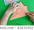 Origami step by step. How to make a paper bunny for Easter greetings 62610302