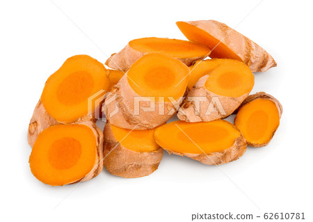 turmeric root slices isolated on white background close up turmeric root slices isolated on white background close up 62610781