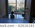 Family bath woman bathing (B) 62616183