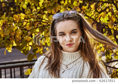 Portrait of a young woman with long blond hair Portrait of a young woman with long blond hair 62617851