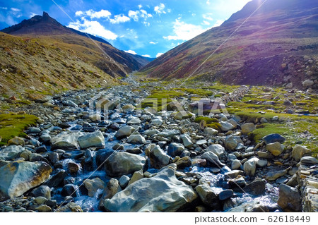 Scenery when touring by motorcycle from Ladakh region in India to Zanskar, a solitary island on land. 62618449