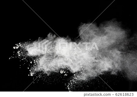 Freeze motion of white dust particles splash on black background.White powder explosion clouds. Freeze motion of white dust particles splash on black background.White powder explosion clouds. 62618623