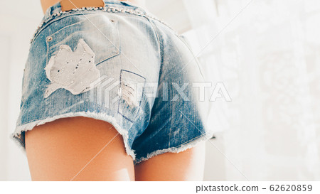 seductive female buttocks distressed denim shorts 62620859