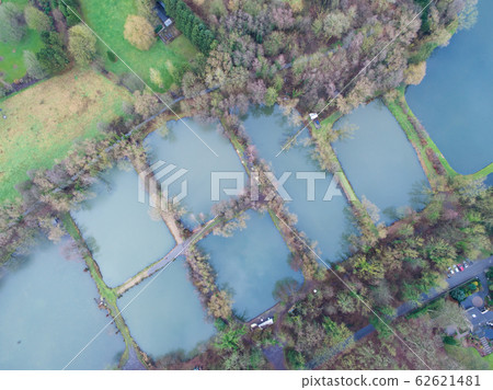 Aerial top view of country side landscape with forest and lake, 62621481
