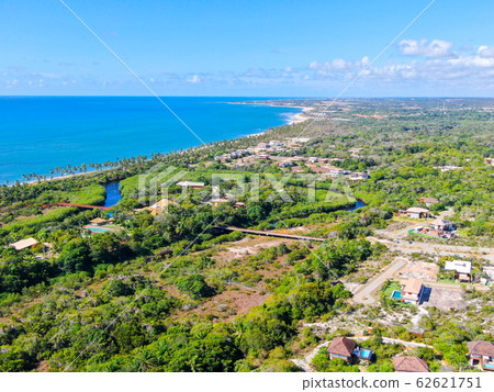 Aerial view of Praia Do Forte coastline town with blue ocean, Bahia, Brazil. 62621751