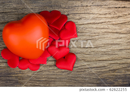 Red heart on the wood floor Red heart on the wood floor 62622255
