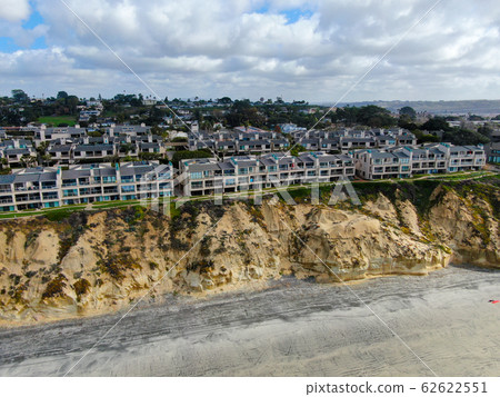 Aerial view of Del Mar North Beach, California coastal cliffs and House with blue Pacific ocean 62622551