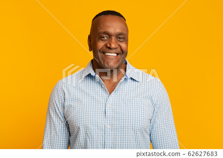 Portrait of middle aged african american man with happy smile Portrait of middle aged african american man with happy smile 62627683