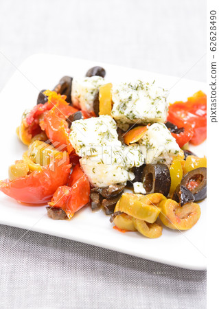 Greek feta cheese and marinated semi-dried tomatoes Greek feta cheese and marinated semi-dried tomatoes 62628490