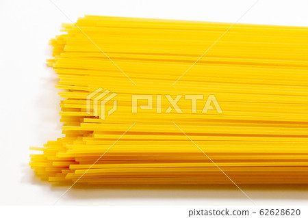 Up of spaghetti (dry noodles). (White background) Up of spaghetti (dry noodles). (White background) 62628620