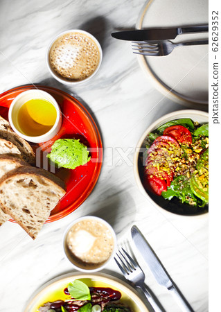 Salad and snack bowl on table Salad and snack bowl on table 62629352
