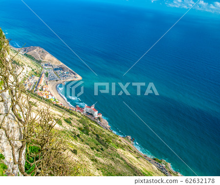 Paradise with mountain, sea, hotel and beach with transparent water 62632178