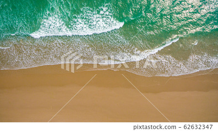 Top view aerial image from drone of an stunning beautiful sea landscape beach with turquoise water with copy space for your text.Beautiful Sand beach with turquoise water,aerial UAV drone shot Top view aerial image from drone of an stunning beautiful sea landscape beach with turquoise water with copy space for your text.Beautiful Sand beach with turquoise water,aerial UAV drone shot 62632347