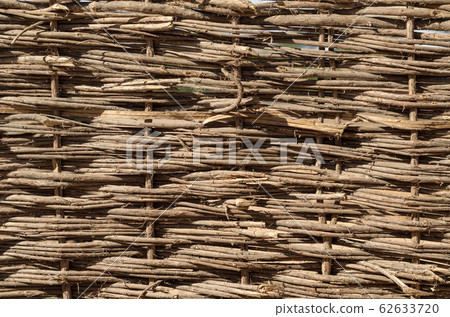 texture of wooden wicker fence closeup texture of wooden wicker fence closeup 62633720