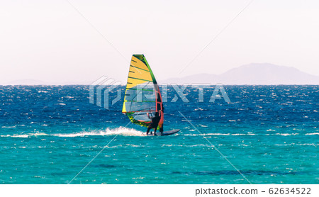 one surfer rides in the Red Sea in Egypt 62634522