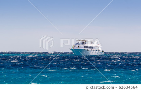 white pleasure boat in the Red Sea in Egypt Dahab white pleasure boat in the Red Sea in Egypt Dahab 62634564