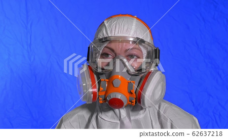 Scientist virologist in respirator. Woman close up look, wearing protective medical mask. Concept health safety N1H1 coronavirus epidemic 2019 nCoV. 62637218