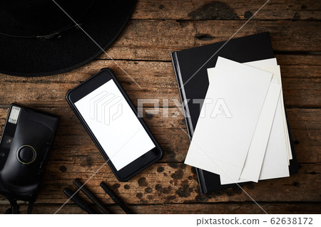 Smartphone white screen on wooden table. . Smartphone white screen on wooden table. . 62638172