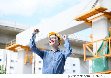 Young asian engineers are celebrate success career in the construction site background 62645650