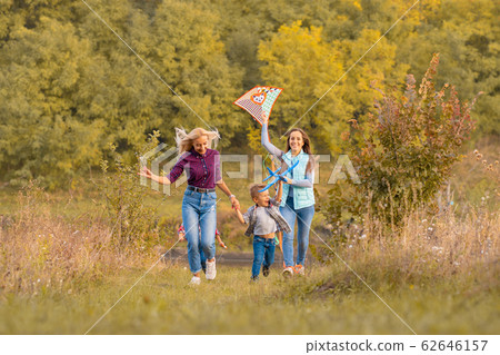 Happy non traditional family of two young mother 62646157