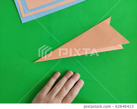 Origami step by step. How to make a paper bunny Origami step by step. How to make a paper bunny 62646423