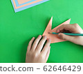 Origami step by step. How to make a paper bunny 62646429