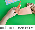 Origami step by step. How to make a paper bunny 62646430